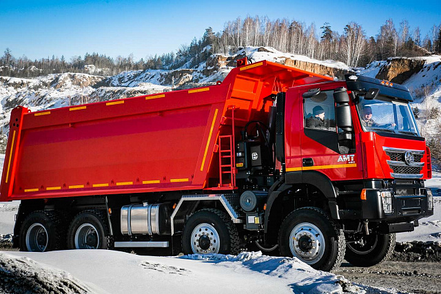 Самосвал AMT 752900 8х8 с кузовом полукруглого типа на 23м3