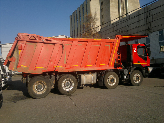 Самосвал AMT N.V.753901 8х4 с кузовом 23 м3